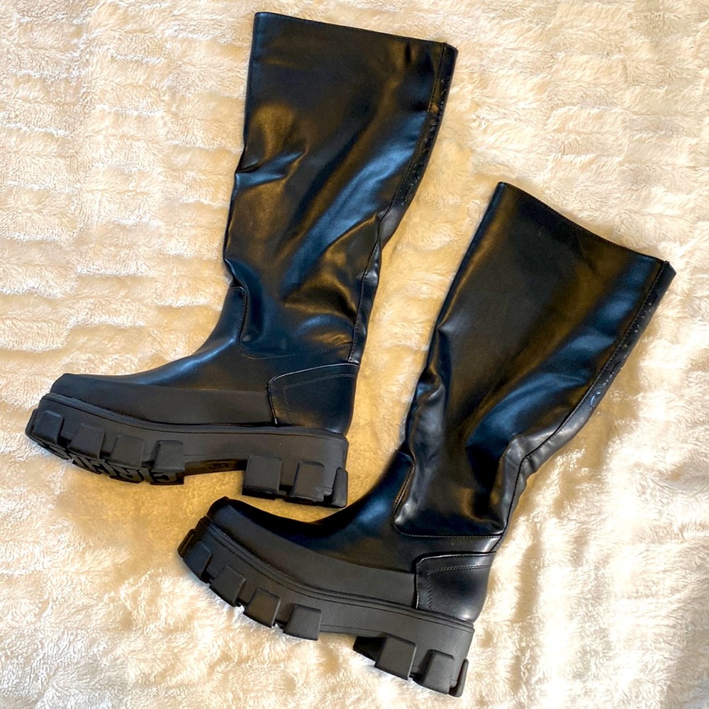 Knee high lug boots